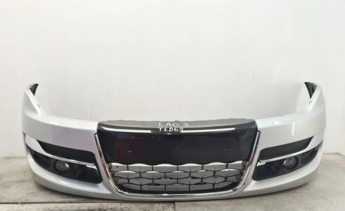 Paragolpes Laguna 2014